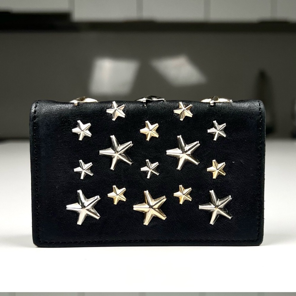 Jimmy Choo compact Black Wallet with Silver and Gold Stars. Like new